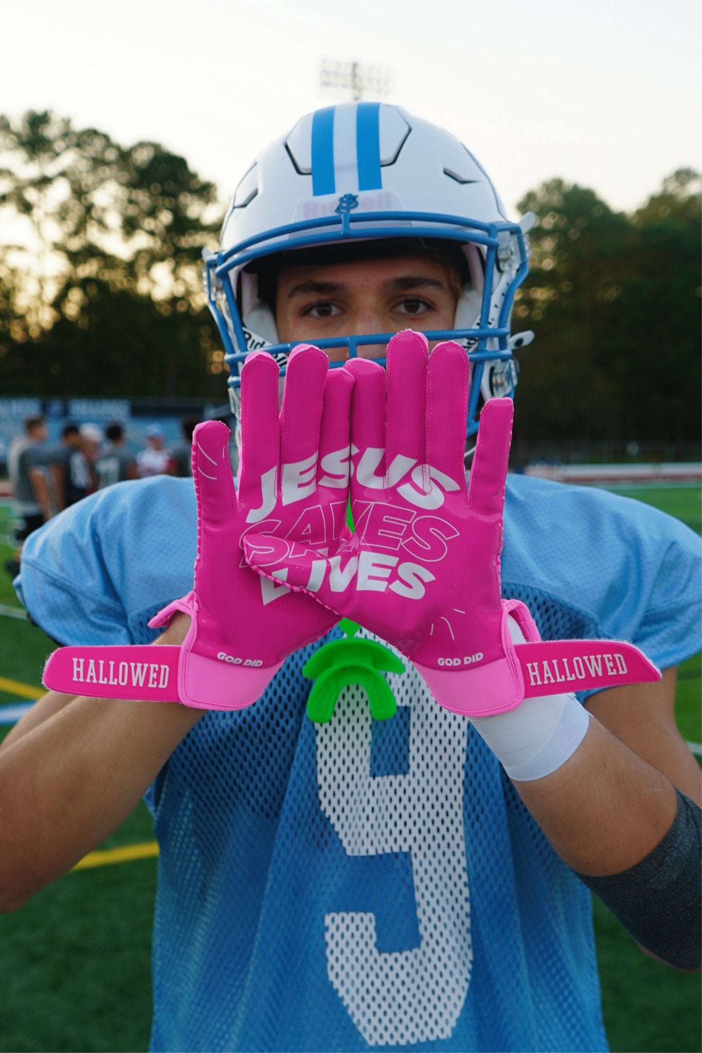 Pink “Jesus Saves Lives” Football Gloves - Main Image